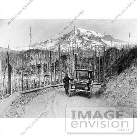 #21617 Historical Stock Photography of a Man Viewing a Mountain and Forest Fire Damage During a Detroit Electric Automobile From Seattle to Mt Rainier Tour in Washington in 1919 by JVPD