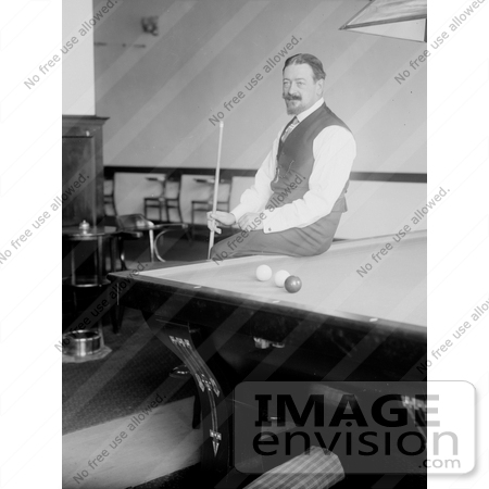 #21659 Stock Photography of Firmin Cassignol Seated on the Edge of a Table, Holding His Cuestick by JVPD