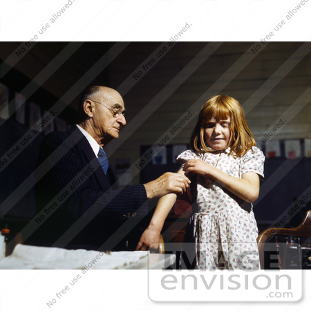 #21675 Stock Photography of a Man Giving a Little Red Haired Girl a Shot by JVPD