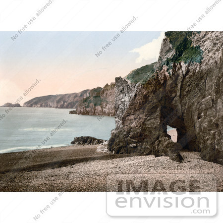 #21775 Historical Stock Photography of a Cave Through the Rocks on the Beach of Dixcart Bay in Sark, England by JVPD