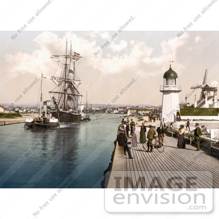 #21982 Stock Photography of Steamboat Tugging a Ship Past the Pier and Windmill in Littlehampton Arun West Sussex England UK by JVPD