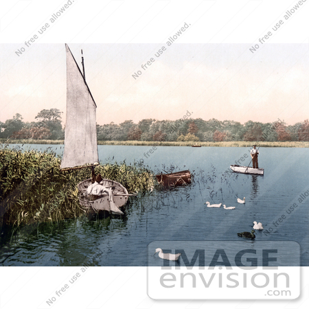 #22100 Stock Photography of Ducks and Men in Boats on the Trinity Broads Ormesby Norfolk England by JVPD