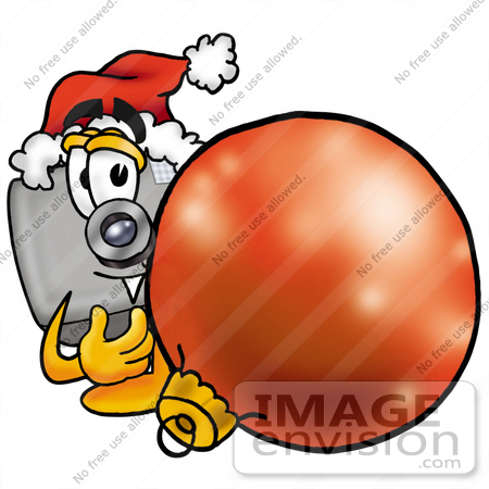 #23199 Clip Art Graphic of a Flash Camera Cartoon Character Wearing a Santa Hat, Standing With a Christmas Bauble by toons4biz