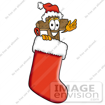#23549 Clip Art Graphic of a Wooden Cross Cartoon Character Wearing a Santa Hat Inside a Red Christmas Stocking by toons4biz