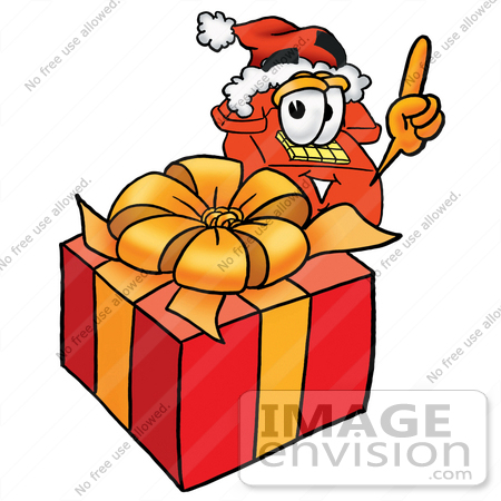 #26059 Clip Art Graphic of a Red Landline Telephone Cartoon Character Standing by a Christmas Present by toons4biz