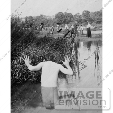 #26690 Stock Photography of a Nude Man Skinny Dipping Behind Reeds in a Pond, Hiding From People on Shore in 1900 by JVPD