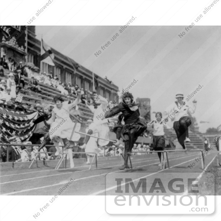 #26767 Stock Photography of Competitve Women Racing on a Track and Jumping Hurdles by JVPD