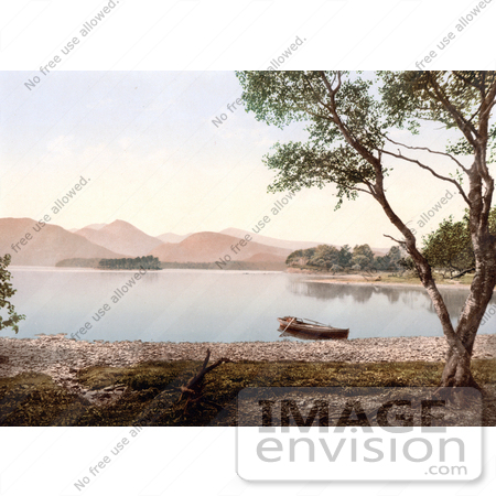 #26785 Stock Photography of a Rowboat on Still Waters of Scarfclose Bay and Mountains in the Background Derwentwater Lake District Cumbria England UK by JVPD