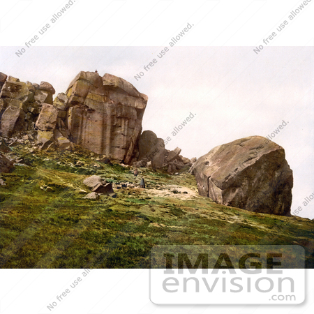 #26832 Stock Photography of a Man Looking Down From the Cliff Over Two People at Cow and Calf Rocks in Ilkley West Yorkshire England UK by JVPD