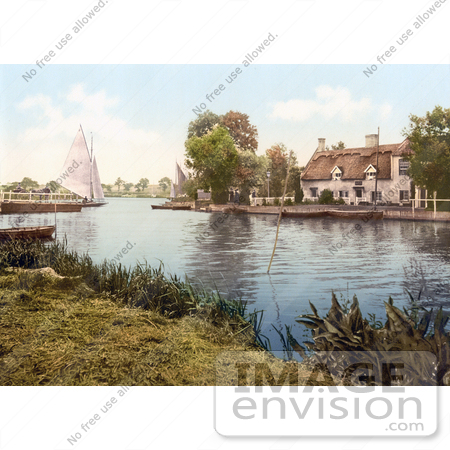 #26842 Stock Photography of a Sailboat Near a Carriage on a Ferry, Crossing the River Bure in Horning Norfolk England by JVPD