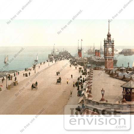 #26856 Stock Photography of Steamers and Sailboats in the Harbor and People Near the Clock Tower on Victoria Pier Douglas Isle of Man England by JVPD