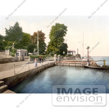 #26938 Stock Photography of People Strolling Along the Waterfront by the RYS Club House in Cowes Isle of Wight England UK by JVPD