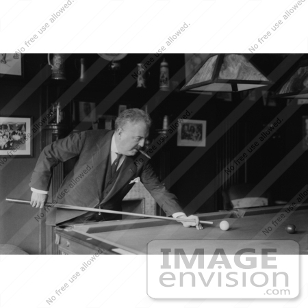 #27930 Stock Photograph of A Man, Victor Herbert, Leaning Over To Aim A Cue Stick While Playing Billiards In A Pool Hall by JVPD
