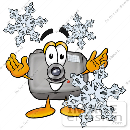 #28364 Clip Art Graphic of a Flash Camera Cartoon Character Surrounded by Snowflakes in Winter by toons4biz