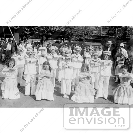 #30216 Stock Photo of A Group Of School Children Dancing On A Playground, 1915 by JVPD