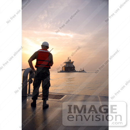 #30647 Stock Photo of a Navy Sailor Standing on the Deck of the Improved Navy Lighterage System (INLS) Discharge Facility by JVPD