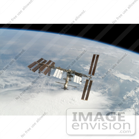 #30726 Stock Photo Of The International Space Station Backdropped By Earth’s Horizon On February 18th 2008 by JVPD