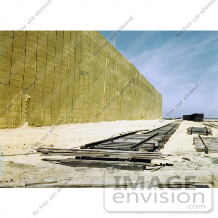 #30942 Stock Photo of Boxcars Ready For Loading On The Railroad By A 60 Foot Tall Sulphur Vat At The Freeport Sulphur Company In Hoskins Mound, Texas by JVPD