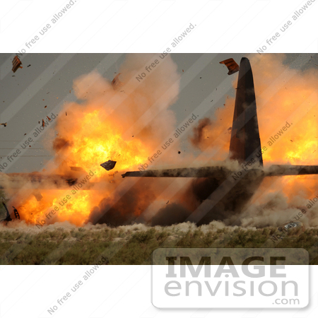 #35249 Stock Photo of The U.S. Air Force Detonating Explosives Attached To The Wings Of A C-130 Hercules Aircraft At Sather Air Base In Iraq by JVPD