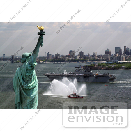 #35250 Stock Photo of The Amphibious Assault Ship USS Kearsarge On The Hudson River, Passing By The Statue Of Liberty In New York During The Parade Of Ships For Fleet Week, 2008 by JVPD