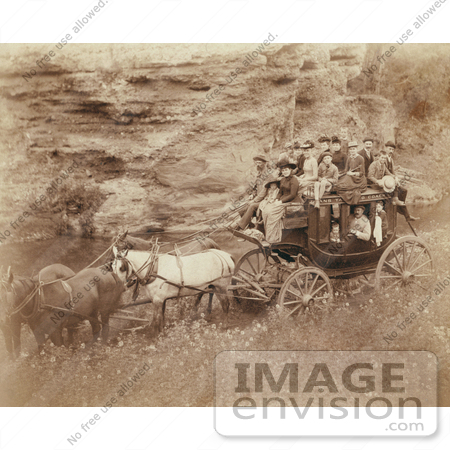 #35633 Stock Photo of a Group Of People Riding A Horse Drawn Stagecoach Owned By Tallyho Coaching, At The Great Hot Springs Of Dakota by JVPD