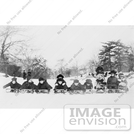 #35661 Stock Photo Of A Group Of Children, Boys And Girls, Posing On Sleds In Central Park, New York City by JVPD