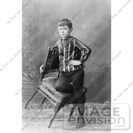 #35676 Stock Photo Of Child Prodigy, Jozef Hofmann, Standing And Leaning On A Tilted Chair by JVPD