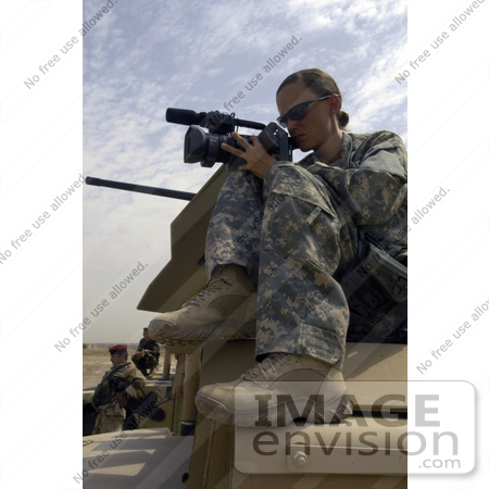 #35685 Stock Photo of a Female Videographer United States Air Force Soldier Recording Iraqi Soldiers at Camp Echo by JVPD