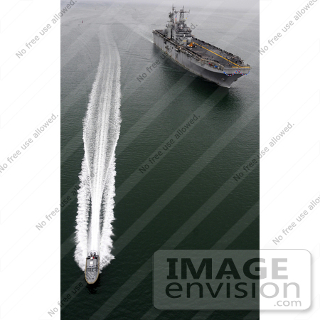 #36172 Stock Photo Of Security Boats Escorting The Amphibious Assault Ship Uss Peleliu Through San Diego Bay by JVPD