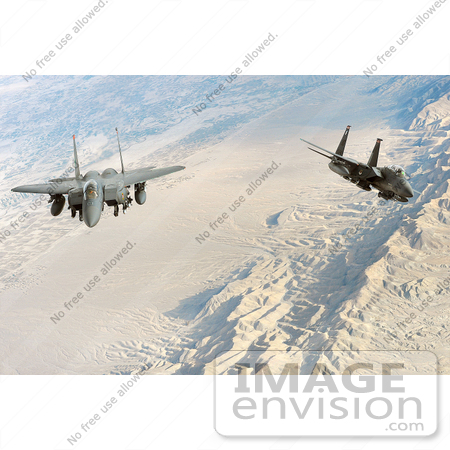 #36180 Stock Photo of Two United States Air Force F-15E Strike Eagle Aircraft Conducting a Flight Over Afghanistan by JVPD