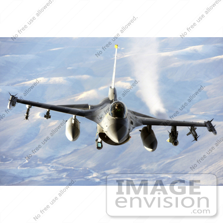 #36192 Stock Photo of a F-16 Fighting Falcon Flying Over the Pacific Alaskan Range Complex by JVPD