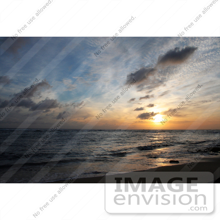 #36505 Stock Photo of a Sunset Seascape With An Orange Burst In The Sky, Poipu, Kauai, Hawaii by Jamie Voetsch