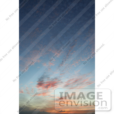#36508 Stock Photo of a Hawaiian Sunset Sky Of Pink And Orange Wispy And Spotted Clouds Over Blue by Jamie Voetsch