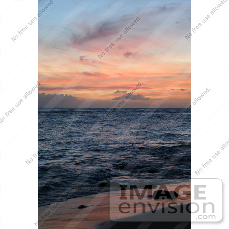 #36512 Stock Photo of a Dusk Sky Of Pink Clouds Over The Ocean, Reflecting Off Of The Wet Sand, Poipu, Kauai, Hawaii by Jamie Voetsch