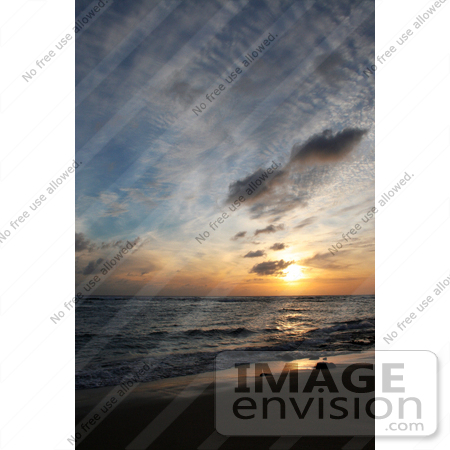 #36515 Stock Photo of a Beautiful Sunset Seascape With An Orange Burst In The Sky, Poipu, Kauai, Hawaii by Jamie Voetsch