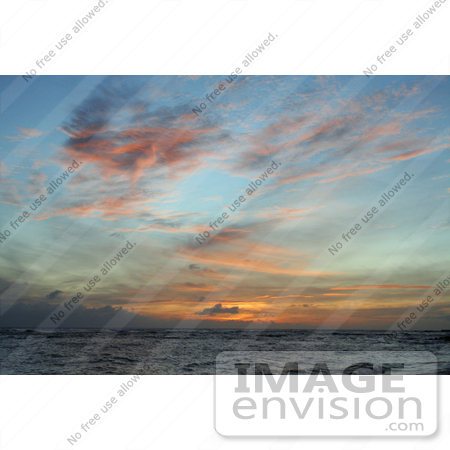 #36517 Stock Photo of Scattered Orange And Pink Wispy Clouds At Sunset, Over The Ocean, Poipu, Kauai, Hawaii by Jamie Voetsch