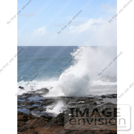 #36535 Stock Photo of The Blowhole, Spouting Horn, Spurting Up Water By The Pacific Ocean, Poipu, Kauai, Hawaii by Jamie Voetsch
