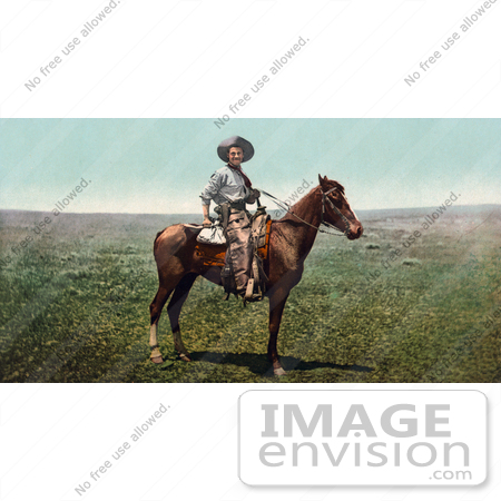 #40664 Stock Photo Of A Friendly Cowboy Pausing On Horseback In A Pasture by JVPD