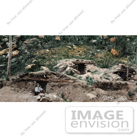#40881 Stock Photo Of A Man Smoking A Pipe And Sitting In The Doorway Of A Dugout House, Colorado by JVPD