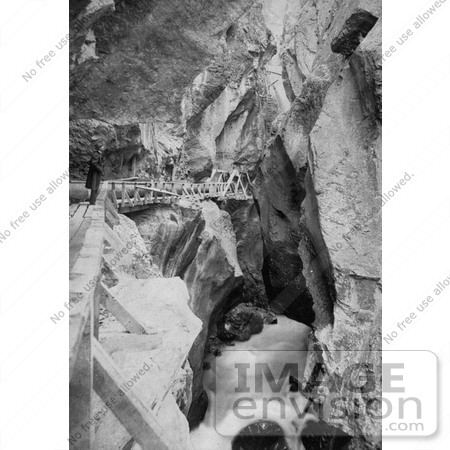 #40904 Stock Photo of a Man Walking Through The Box Canyon In Ouray, Colorado by JVPD