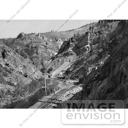 #40972 Stock Photo Of Men Standing By Train Tracks At The Eagle River Canyon Mines In Colorado by JVPD