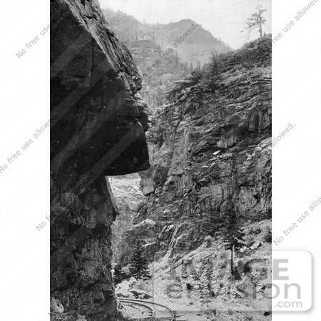 #41005 Stock Photo Of Train Tracks Curving Around Hanging Rock In Clear Creek Canyon In The Rocky Mountains, Colorado by JVPD