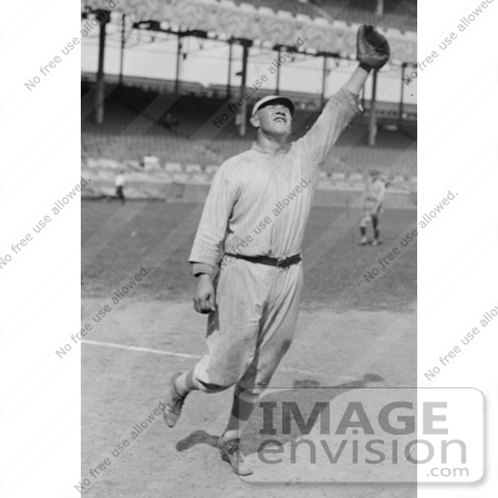 #41253 Stock Photo of Jim Thorpe In His Giants Uniform, Holding Up A Gllove To Catch A Baseball by JVPD