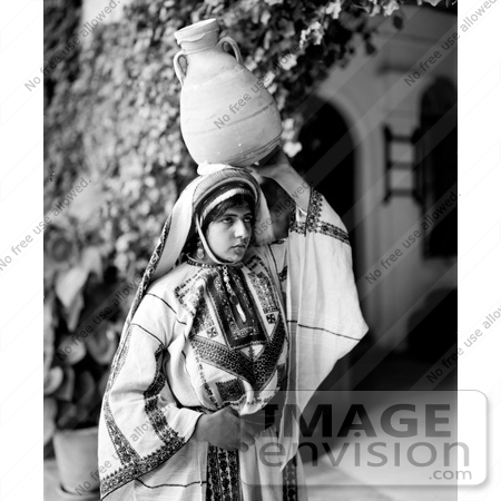#43226 RF Photo Of A Black And White Ramallah Woman Carrying A Jug On Her Head by JVPD