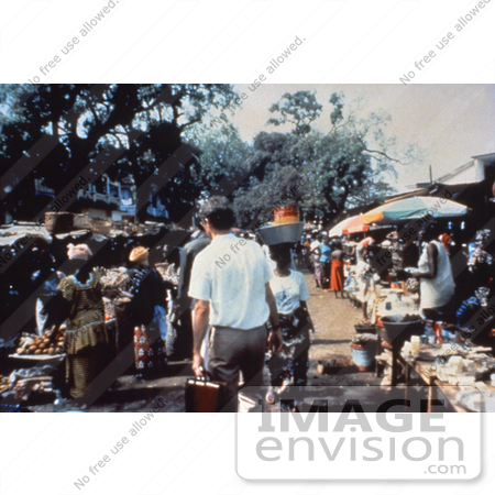 #5167 Photography of a Epidemic Intelligence Service (EIS) Officer Walking Through a Diseased Market Full of People by JVPD