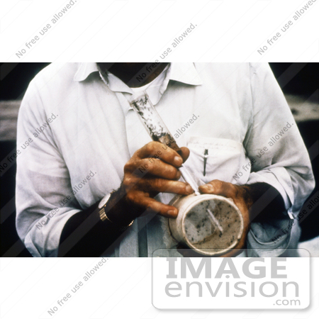 #5185 Stock Photography of a Researcher Discharging Mosquitoes from the Catch-Tube of a Hand-Held Mechanical Aspirator by JVPD