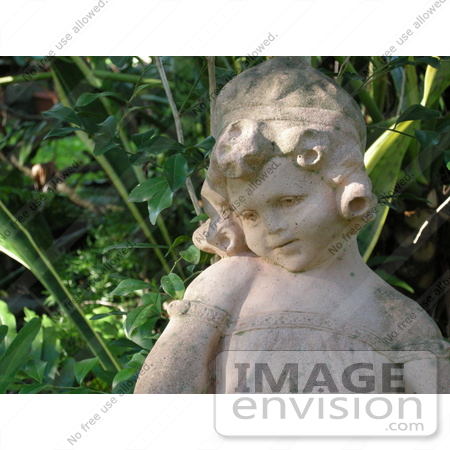 #53834 Royalty-Free Stock Photo of a girl garden statue by Maria Bell