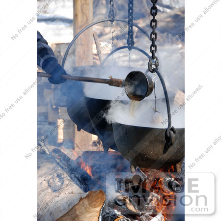 #53860 Royalty-Free Stock Photo of an Iron Kettle by Maria Bell