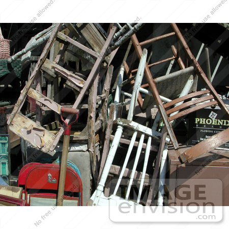 #53871 Royalty-Free Stock Photo of a pile of old chairs by Maria Bell