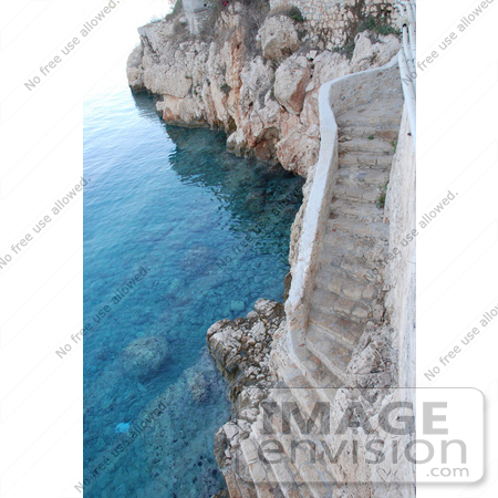 #53893 Royalty-Free Stock Photo of stone stairs on a beach by Maria Bell